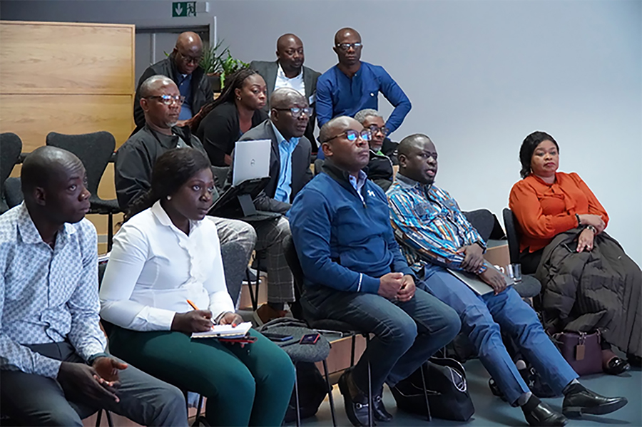 The Ghanaian delegation listening to a presentation on Health Care Denmark